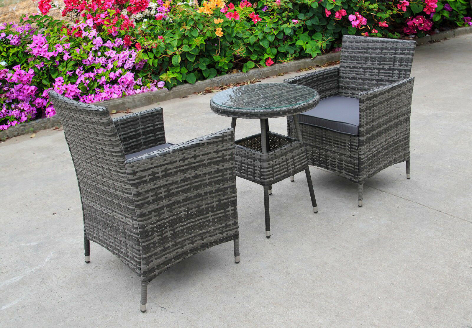 Rattan garden furniture 2 outlet chairs and table